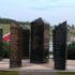 a collection of marble monuments with golden names on them in Lunenberg, NS.